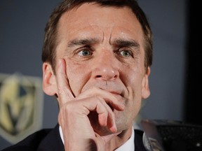 Vegas Golden Knights general manager George McPhee listens during a news conference on April 13, 2017. (THE CANADIAN PRESS/AP/John Locher)