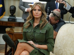 First lady Melania Trump listens during a meeting between her husband President Donald Trump and Argentine President Mauricio Macri in the Oval Office of the White House in Washington, Thursday, April 27, 2017. (AP Photo/Evan Vucci)