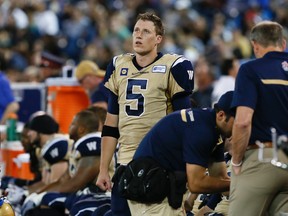 Winnipeg Bombers quarterback Drew Willy shows his dismay as the Toronto Argonauts beat the Winnipeg Blue Bombers in CFL action tonight at the Rogers Centre on Aug. 12, 2014. (Stan Behal/Toronto Sun)