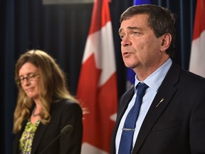 Minister of Agriculture and Forestry, Oneil Carlier and Jennifer Wood, chair of Agriculture Finance Services Corporation (AFSC), announcing a new board of directors for the AFSC, at the Legislature in Edmonton, Thursday, April 27, 2017.