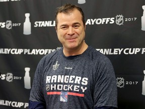 New York Rangers head coach Alain Vigneault talks to reporters after a practice in Tarrytown, N.Y., on April 25, 2017. (AP Photo/Seth Wenig)