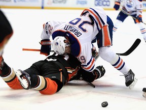 Leon Draisaitl of the Edmonton Oilers pushes Ryan Getzlaf of the Anaheim Ducks to the ice in Game 1 of their Western Conference second-round playoff series at Honda Center on April 26, 2017, in Anaheim, Calif. (Sean M. Haffey/Getty Images)