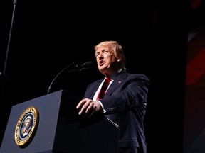 U.S. President Donald Trump speaks at the National Rifle Association Leadership Conference in Atlanta on Friday, April 28, 2017. (AP Photo/Evan Vucci)