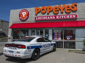 Homicide scene outside of the Popeye's at 2515 Hurontario St., in Mississauga, Ont. on Friday April 28, 2017. Peel Regional Police say Kamar McIntosh, 19, was gunned down 3:30 p.m yesterday. (Ernest Doroszuk/Toronto Sun)