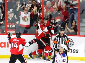 Ottawa Senators centre Ryan Dzingel celebrates his goal with teammates during Game 1 against the New York Rangers at Canadian Tire Centre on April 27, 2017. (THE CANADIAN PRESS/Fred Chartrand)