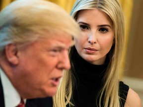 This file photo taken on April 24, 2017 shows Ivanka Trump listening while her father US President Donald Trump speaks via video with NASA astronauts aboard the International Space Station from the Oval Office of the White House in Washington, DC. First Daughter Ivanka Trump is contradicting her father, the US president, insisting that allowing Syrian refugees to immigrate to the United States "has to be part of the discussion" over ending Syria's years old civil war."I think there is a global humanitarian crisis that's happening, and we have to come together, and we have to solve it," she told NBC News in an interview aired April 26, 2017 (BRENDAN SMIALOWSKI/AFP/Getty Images)