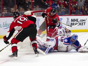 New York Rangers goalie Henrik Lundqvist makes a save against Ottawa Senators during the third period of play at Canadian Tire Centre on April 8, 2017. (Ashley Fraser/Postmedia)