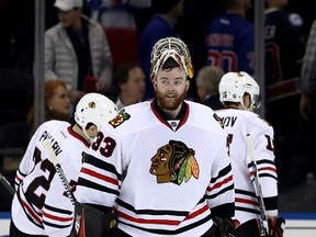 Scott Darling of the Chicago Blackhawks celebrates a win over the New York Rangers on Dec. 13, 2016 at Madison Square Garden. (Elsa/Getty Images)