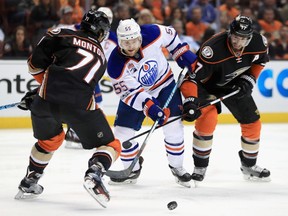 Brandon Montour #71 and Ryan Kesler #17 of the Anaheim Ducks defend against Mark Letestu #55 of the Edmonton Oilers in the second period in Game One of the Western Conference Second Round during the 2017  NHL Stanley Cup Playoffs at Honda Center on April 26, 2017 in Anaheim, California.