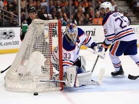 Cam Talbot #33 tends goal as Darnell Nurse #25 of the Edmonton Oilers skates past during the third period of Game 2 of the Western Conference Second Round during the 2017 NHL Stanley Cup Playoffs against the Anaheim Ducks  at Honda Center on April 28, 2017 in Anaheim, California.