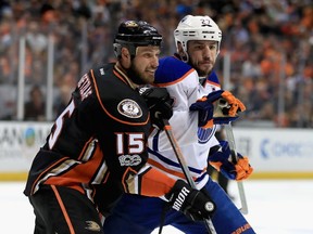 Ryan Getzlaf #15 of the Anaheim Ducks pushes Milan Lucic #27 of the Edmonton Oilers during the second period of Game Two of the Western Conference Second Round during the 2017  NHL Stanley Cup Playoffs at Honda Center on April 28, 2017 in Anaheim, California.