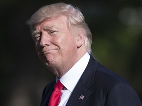 U.S. President Donald Trump walks after arriving on Marine One on the South Lawn of the White House in Washington, D.C., April 28, 2017, following a trip to Atlanta, Georgia. (SAUL LOEB/AFP/Getty Images)