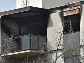 Damage caused after an apartment fire on an upper level corner suite of the Southgate Apartments, 10405 Saskatchewan Dr. in Edmonton, April 29, 2017. Two residence and a firefighter were taken to hospital with minor injures. Ed Kaiser/Postmedia