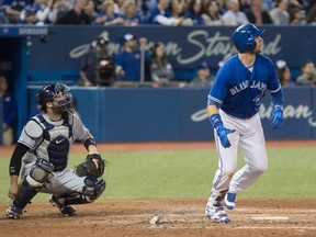 Blue Jays' Justin Smoak hits a two-run home run against the Rays in the sixth inning of MLB action in Toronto on Saturday, April 29, 2017. (Fred Thornhill/The Canadian Press)
