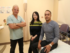Toronto health professionals Dr. Chris Boulias, left, occupational therapist Ayako Sasaki and Dr. Farooq Ismail held clinics at Health Sciences North in Sudbury, Ont. this past weekend to provide patients post-stroke treatment and management. John Lappa/Sudbury Star/Postmedia Network