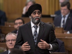 Minister of National Defence Harjit Sajjan rises during Question Period in the House of Commons on Parliament Hill, Friday, April 7, 2017 in Ottawa. Defence Minister Harjit Sajjan says he is truly sorry after claiming in a recent speech to have been the architect of Canada's largest battle in Afghanistan. (THE CANADIAN PRESS)