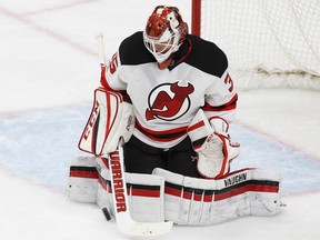 Devils goaltender Cory Schneider makes a save against the Oilers during NHL action in Edmonton on Jan. 12, 2017. The Devils won the NHL draft lottery on April 29, 2017 and will have the first-overall pick in at the draft in late June. (Ian Kucerak/Postmedia Network/Files)