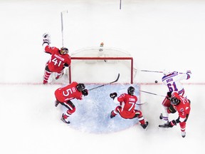Senators forward Kyle Turris (7) knocks the puck away from a sure goal as goaltender Craig Anderson (41) is caught out of position as defencemen Cody Ceci (5) and Dion Phaneuf (2) defend against Rangers forward Rick Nash in Game 2 of their NHL playoff series in Ottawa on Saturday, April 29, 2017. (Jana Chytilova/Freestyle Photography/Getty Images)