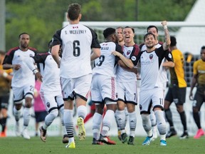Ottawa Fury players celebrate a goal during yesterday’s 2-2 draw with Charleston.Courtesy of Charleston Battery