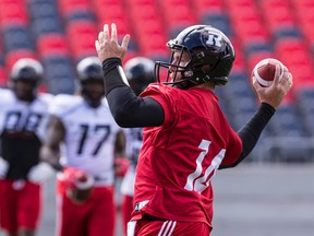 Redblacks quarterback Ryan Lindley rears back to fire a pass at mini-camp yesterday at TD Place. Errol McGihon/Postmedia Network