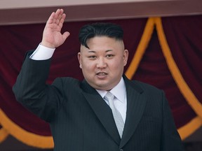 North Korean Leader Kim Jong Un waves from a balcony of the Grand People's Study house following a military parade marking the 105th anniversary of the birth of late North Korean leader Kim Il-Sung, in Pyongyang on April 15, 2017. (ED JONES/AFP/Getty Images)