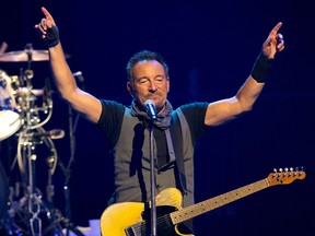 Musician Bruce Springsteen performs with The E Street Band at the AccorHotels Arena in Paris on July 11, 2016. (BERTRAND GUAY/AFP/Getty Images)