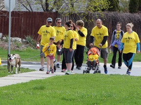 Families participate in the first Steps for Life fundraising walk in Kingston on Saturday. (Steph Crosier/The Whig-Standard)