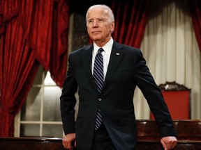 This Jan. 3, 2017, file photo shows former U.S. vice-president Joe Biden pausing between mock swearing in ceremonies in the Old Senate Chamber on Capitol Hill in Washington. (AP Photo/Alex Brandon, File)