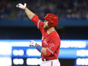 Russell Martin of the Toronto Blue Jays celebrates after hitting the eventual game-winning RBI single in the eighth inning during his team's game against the Tampa Bay Rays at Rogers Centre on April 30, 2017. (TOM SZCZERBOWSKI/Getty Images)