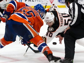 Edmonton Oilers Mark Letestu takes a face-off against the Anaheim Ducks' Antoine Vermette at Rogers Place in Edmonton on Saturday April 30, 2017. (David Bloom)