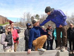 A group of Laurentian University students take part in a trust fall exercise at the university in Sudbury, Ont. on Saturday April 29, 2017. A total of 29 Laurentian students and faculty members are taking part in a month-long expedition to remote western Mongolia. John Lappa/Sudbury Star/Postmedia Network