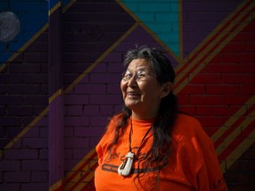 Ma-Nee Chacaby, an Ojibwa-Cree elder from Thunder Bay, Ont., poses for a portrait in Toronto on Friday, April 28, 2017. Chacaby says coming out nearly 30 years ago was like unzipping her skin so she could reveal her true self. Prior to 1988, Chacaby said she was bullied and injured for identifying as two-spirit -- a term she uses to describe carrying both a female and male in her body at the same time. THE CANADIAN PRESS/Cole Burston