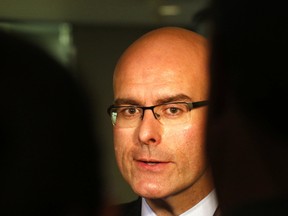 Ontario Transportation Minister Steven Del Duca speaks to media outside the mayor's office following a meeting between PC Leader Patrick Brown and Mayor John Tory in Toronto, Ont. on Monday, May 1, 2017. (Michael Peake/Toronto Sun)