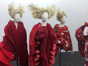 This photo shows part of the exhibit from "Rei Kawakubo/Comme des Garcons Art on the In-Between" at The Metropolitan Museum of Art in New York on Monday, May 1, 2017. The exhibit, which begins with the glitzy Met gala and then opens to the public May 4, is situated in a blinding white space, where visitors are encouraged to follow their own route around a series of geometric structures showing highlights of Kawakubo’s work. (AP Photo/Shelley Acoca)