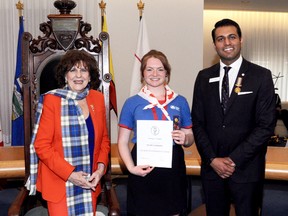 Casey Zayac, was honoured on Friday by Her Honour, the Hounourable Lois E. Mitchell, CM, AOE, LLD, Lieutenant Governor of Alberta and Al-Karim Khimji, division president, at Government House. Casey Zayac was presented a Duke of Edinburgh’s International Silver Award. Submitted Photo.