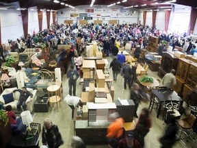 People flood into the Vermilion Curling Arena for the first night of the 10th annual Rotary Club of Vermilion Garage Sale on Thursday, April 20, 2017, in Vermilion, Alta. The day raised over $16,000. Taylor Hermiston/Vermilion Standard/Postmedia Network.