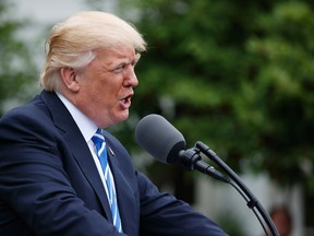 U.S. President Donald Trump speaks in the Kennedy Garden of the White House in Washington on Monday, May 1, 2017. (AP Photo/Evan Vucci)