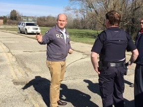 Conservative party leadership hopeful and MP Erin O'Toole (left) at the border crossing at Emerson, Man., on Monday, May 1, 2017. O'Toole visited Emerson's closed former border crossing in the community to pitch its temporary re-opening on Monday as well as stricter enforcement of immigration laws. The Rural Municipality of Emerson-Franklin and the Manitoba government have repeatedly lobbied federal funds and action, as 331 asylum seekers illegally entered Manitoba from the United States during the first three months on 2017 before being taken to Winnipeg. Handout