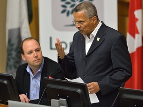 London city councillor Harold Usher, right, and Steven Turner during the debate on ranked ballots at London City Hall on Monday May 1, 2017. (MORRIS LAMONT, The London Free Press)