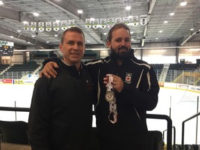 Manager of mixed doubles Jeff Stoughton and Reid Carruthers show off the silver medal Carruthers and Edmonton's Joanne Courtney captured for Canada at the World mixed doubles championship last weekend in Lethbridge, Alta., at a press conference on Tuesday, May 2, 2017, in Portage la Prairie. Portage la Prairie will host the Canadian mixed doubles Olympic curling trials from January 3-7, 2018, at Stride Place.
