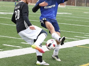 Josh Knewblewski of the Confederation Chargers battles for the ball with Seb Bouchard of the Notre Dame Alouettes during senior boys high school soccer action in Sudbury, Ont. on Monday May 1, 2017. Notre Dame defeated Confederation 3-0.Gino Donato/Sudbury Star/Postmedia Network