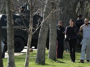 Police take Christopher Brass into custody following a standoff which brought a heavy police presence, including the tactical unit and an armoured vehicle, to the 600 block of Pritchard Avenue in Winnipeg on Tues., May 2, 2017. Kevin King/Winnipeg Sun/Postmedia Network