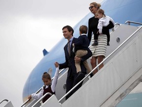 In this Friday, March 3, 2017, file photo, Arabella Kushner, her father, White House senior adviser Jared Kushner, carrying Joseph Kushner, Ivanka Trump, carrying Theodore Kushner, step off Air Force One at the Palm Beach International Airport, in West Palm Beach, Fla. (AP Photo/Alex Brandon, File)