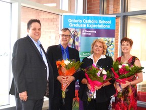 Michael Bellmore, left, chair of the board of trustees at the Sudbury Catholic District School Board, Gaston Theriault, Claire Morrison and Brenda Thompson, recipients of the Chairperson’s Award. Supplied photo