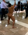 Naked woman shocks passengers at airport_1