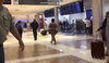 Naked woman shocks passengers at airport_5