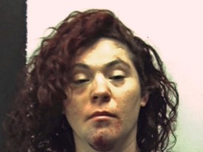 This undated photo provided by the Fayette County Prison in Uniontown, Pa., shows Holly Lynn Donahoo, of Louisville, Ky., who was arrested Tuesday, May 2, 2017, on charges including driving under the influence and fleeing or eluding police. Authorities say Donahoo identified herself as Hillary Clinton after law enforcement personnel chased her from Maryland into Pennsylvania. (Fayette County Prison via AP)