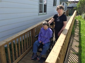 Lowe?s Canada donated the materials needed to build a wheelchair ramp for Ann Daly, left, who lives with her sister Patricia in London. (DEREK RUTTAN, The London Free Press)
