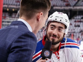 Mika Zibanejad of the New York Rangers talks with Kyle Bukauskas, host at Sportsnet, during warmups prior to a game against the Ottawa Senators in Game 1 at Canadian Tire Centre on April 27, 2017. (Jana Chytilova/Freestyle Photography/Getty Images)