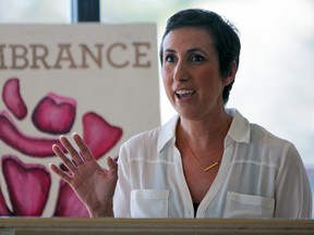 Liz Adamson, a breast cancer patient and participant in the breast reconstruction program at Kingston Health Sciences Centre, speaks at the Rose of Hope Golf Tournament fundraising goal announcement at the Cataraqui Golf and Country Club on Wednesday. (Steph Crosier/The Whig-Standard)